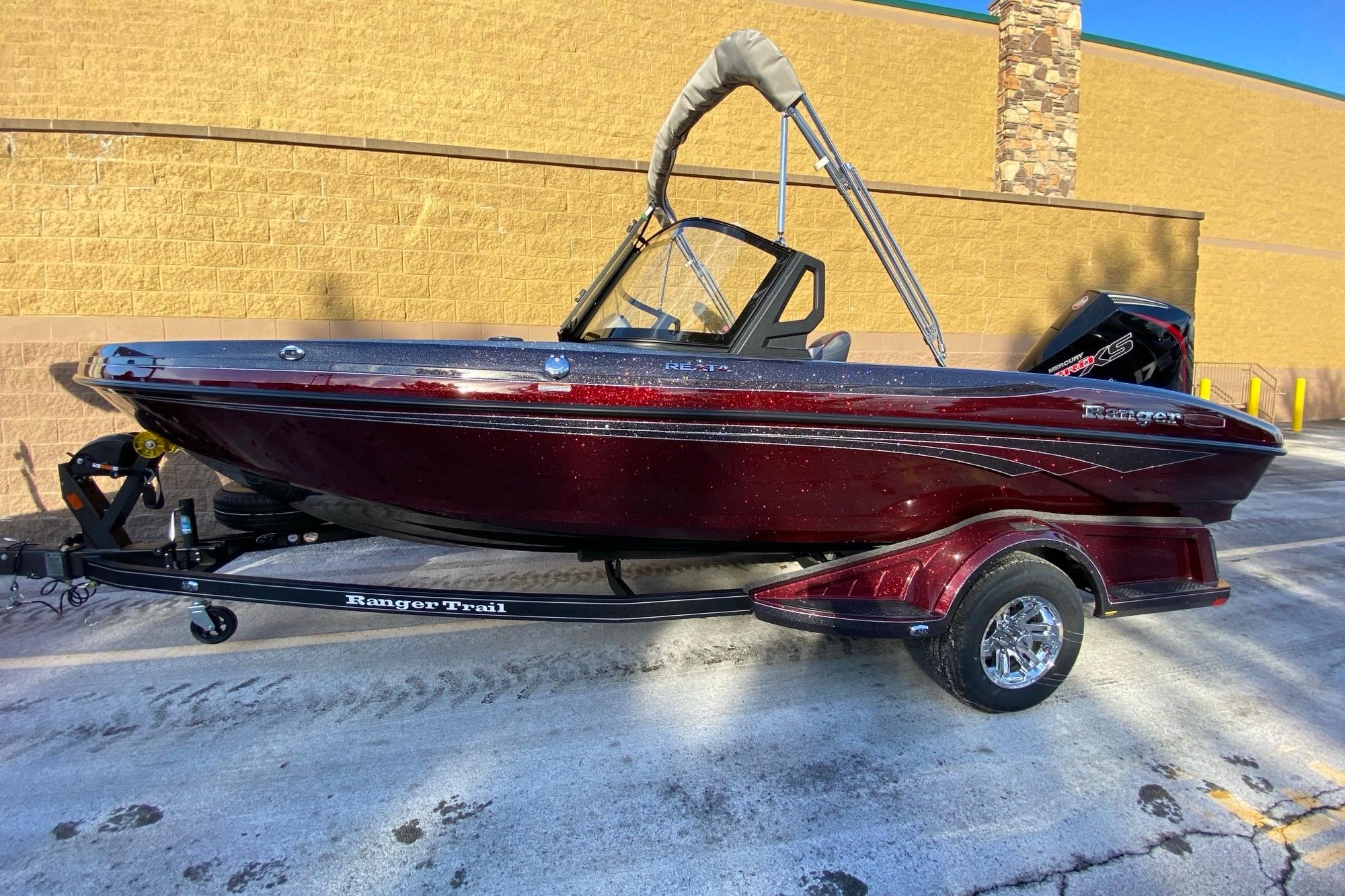 2026 Ranger 1850MS boat on trailer, parked outdoors, side view.