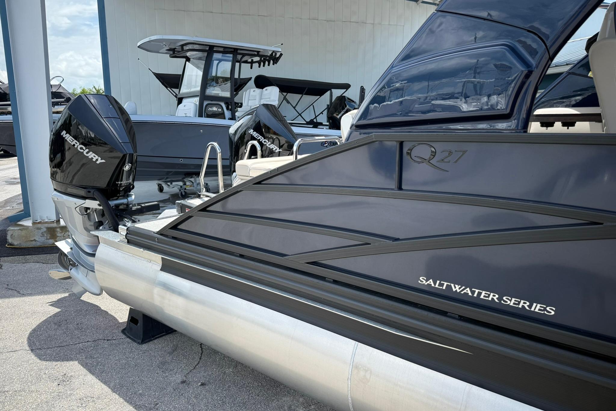 2026 Bennington 27 QSBAT2 Saltwater Series boat with Mercury outboard engines.