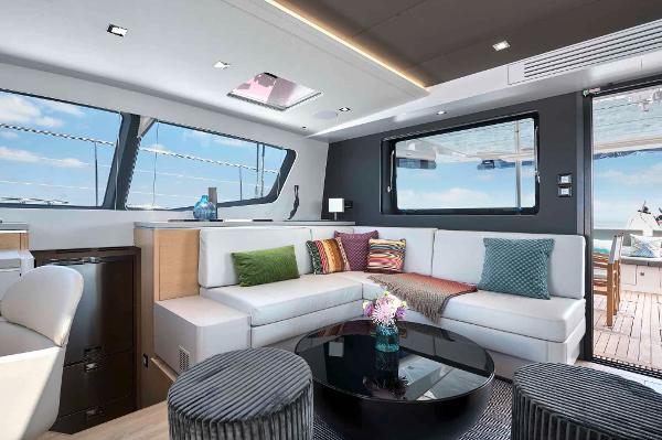 Luxurious interior of 2025 Privilege Signature 580 yacht with modern seating and ocean view.