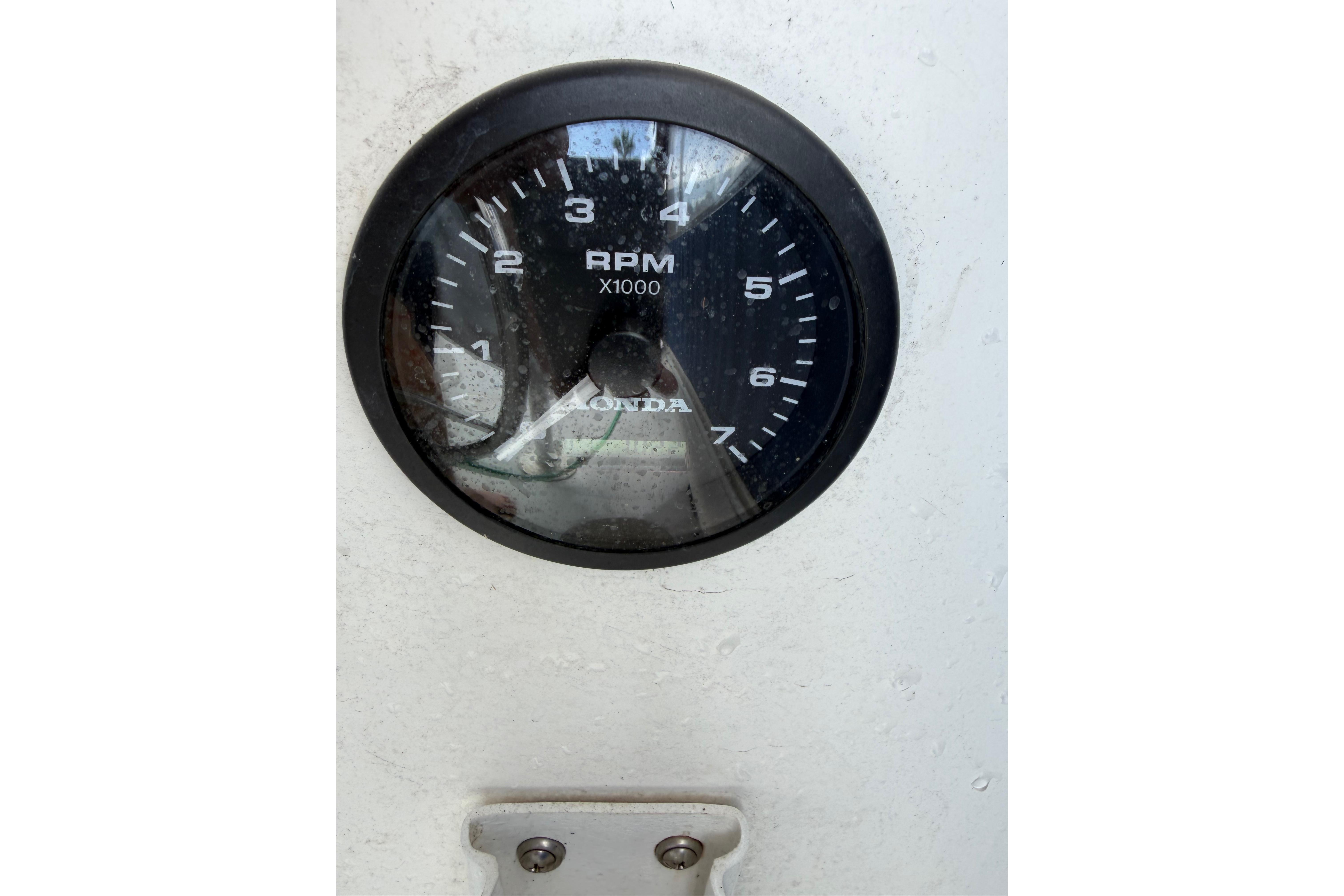 Tachometer gauge on a 2000 Eastern 22 Lobster Fisherman boat, displaying RPM.