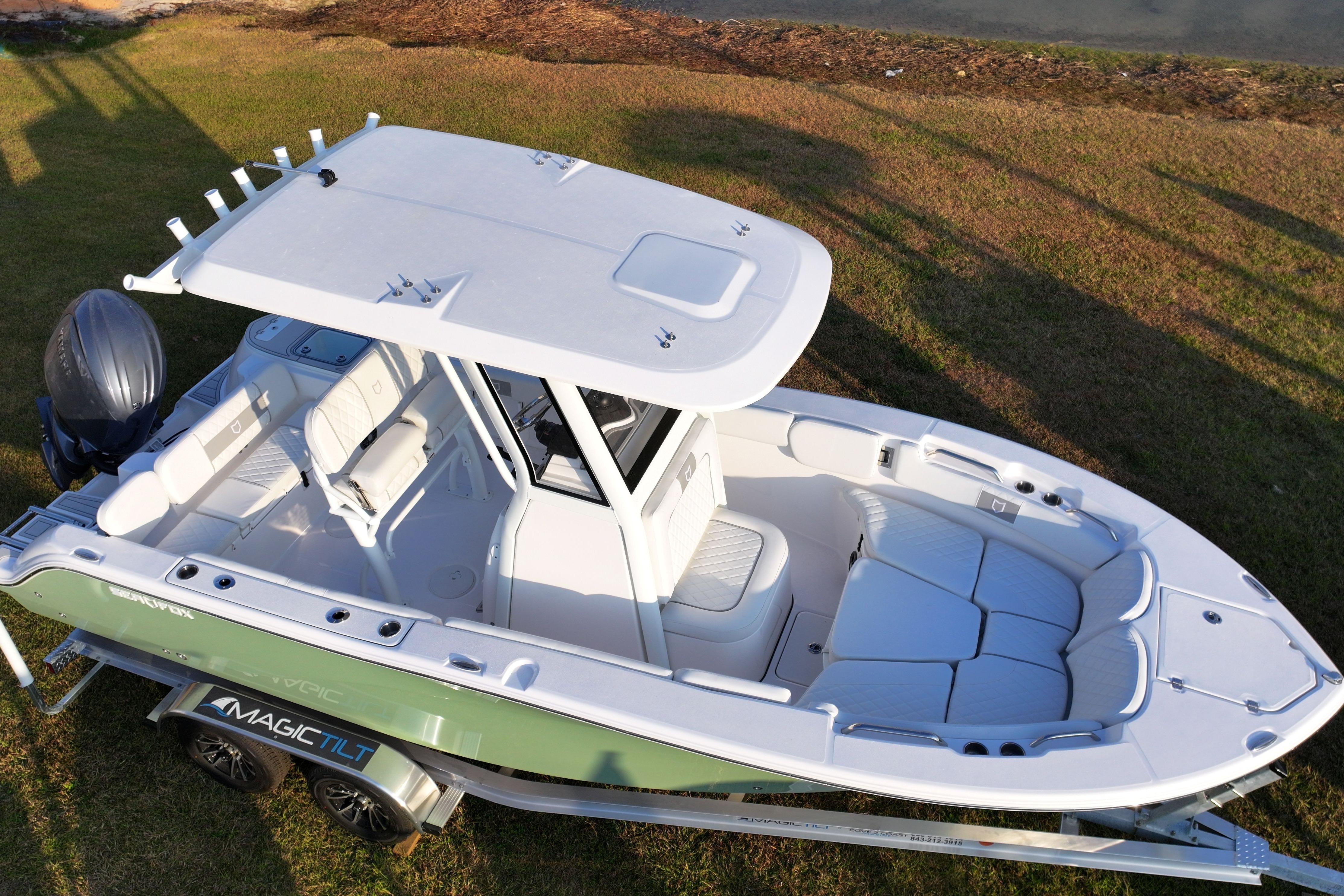 2026 Sea Fox 228 Commander boat on trailer, featuring spacious seating and modern design.