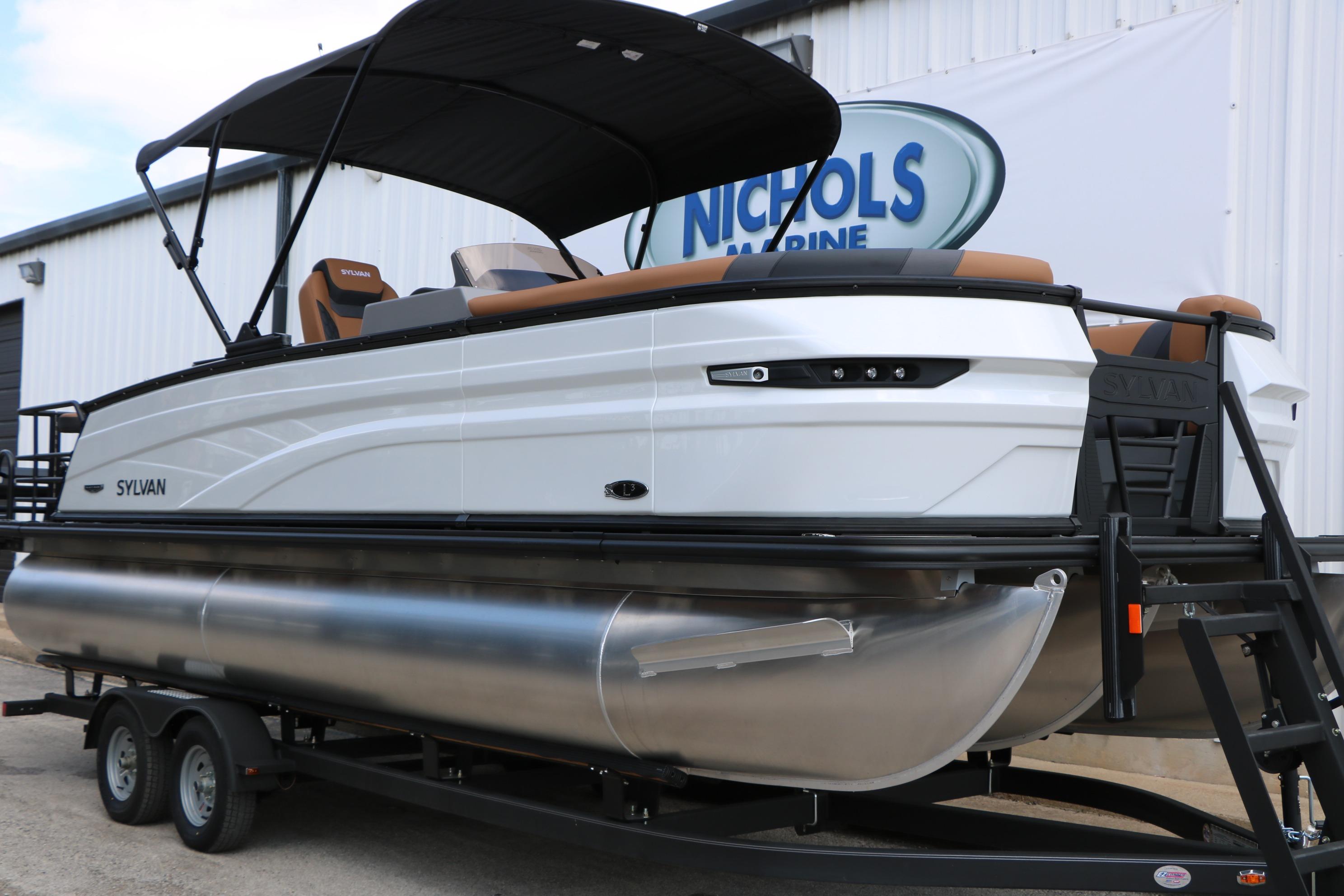 2026 Sylvan L3 DLZ Bar Platinum Edition Tri-Toon boat on trailer at Nichols Marine.