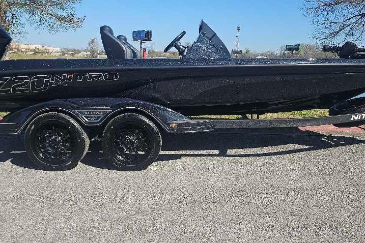 2026 Nitro Z20 XL Pro boat on a trailer, parked outdoors.