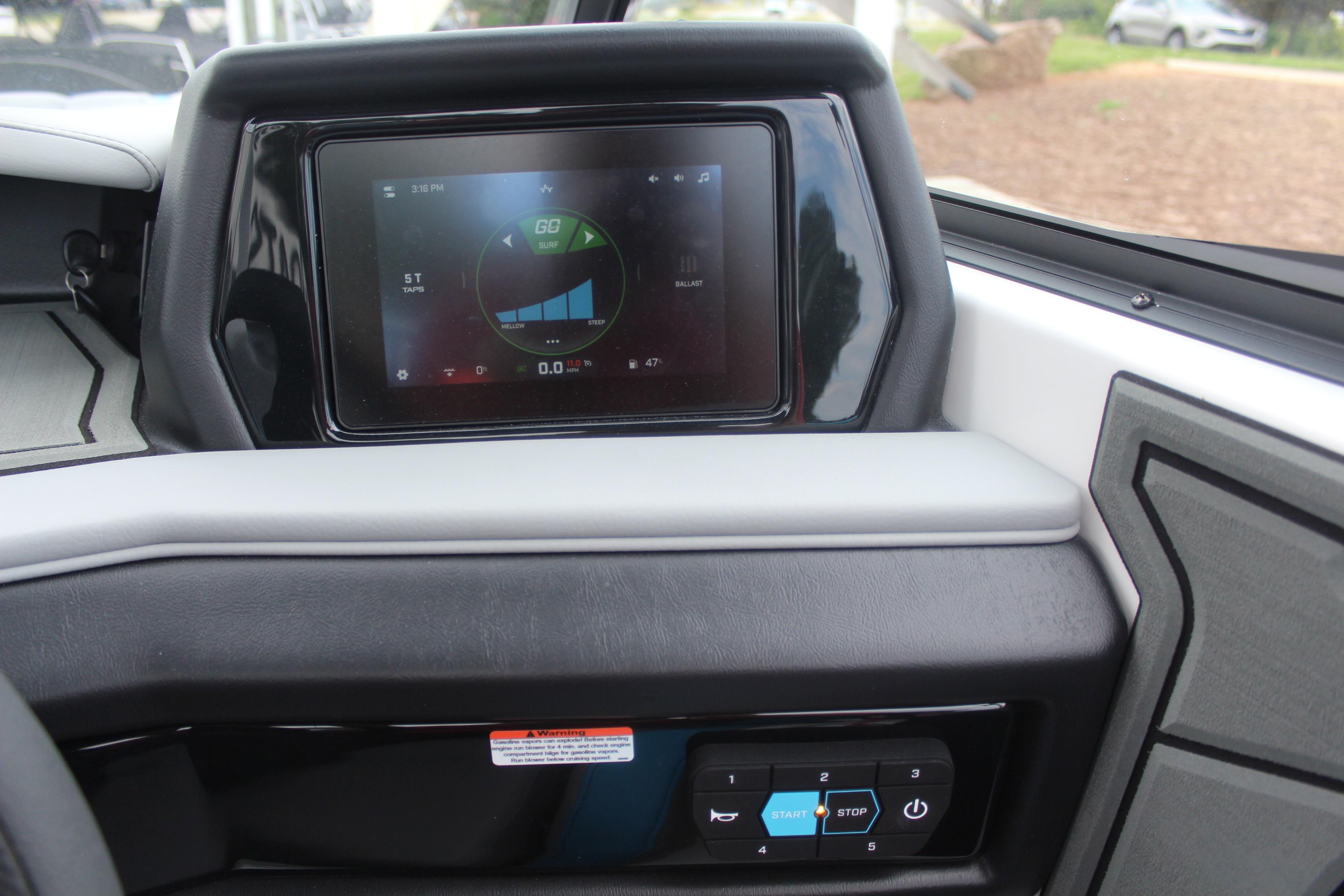 Dashboard of 2026 ATX Surf Boats 22 Type-S with touchscreen controls.