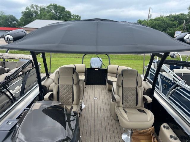 Interior view of a 2023 Veranda VP22RCT pontoon boat with luxurious seating.