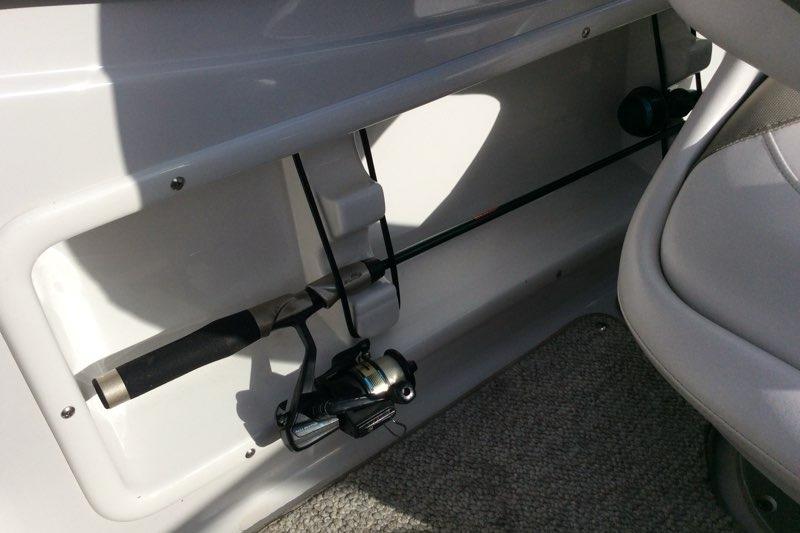 2012 Glastron GT180 boat interior with fishing rod holder.