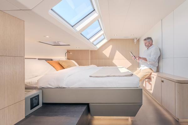 Luxurious interior of 2025 Privilege Signature 650 yacht with skylights and modern design.