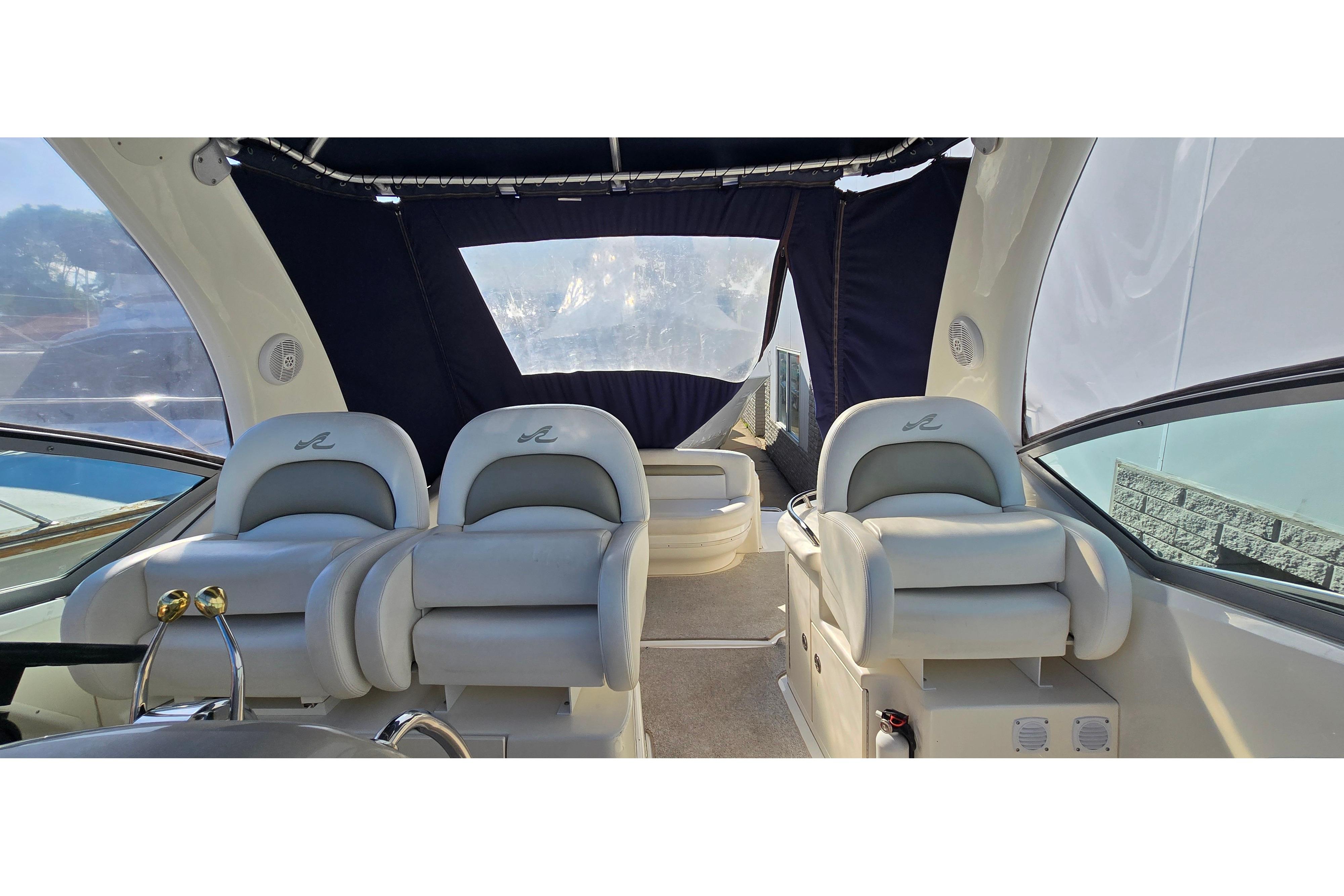 Interior of 2007 Sea Ray 340 Sundancer yacht with plush seating and modern design.