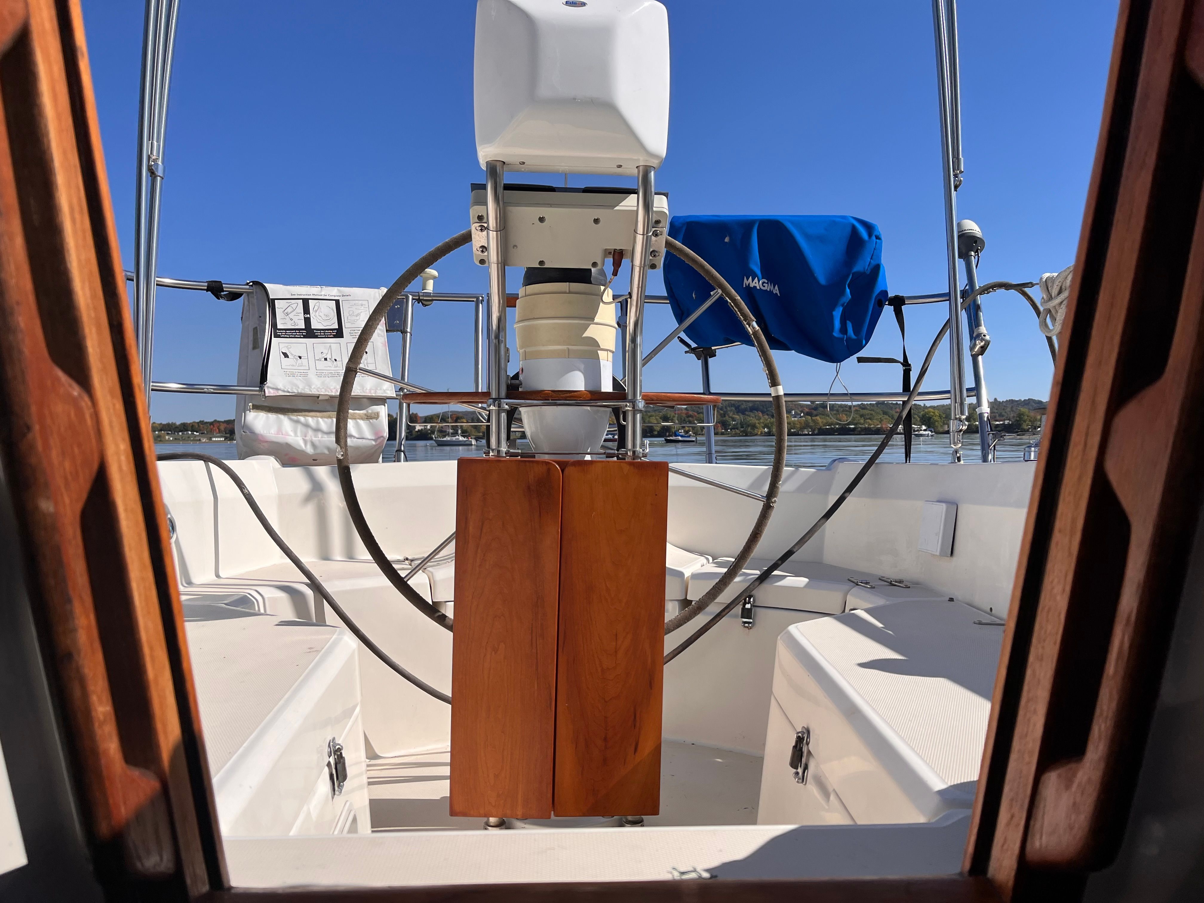 Cockpit of a 1989 Sabre 30 III yacht on calm water.