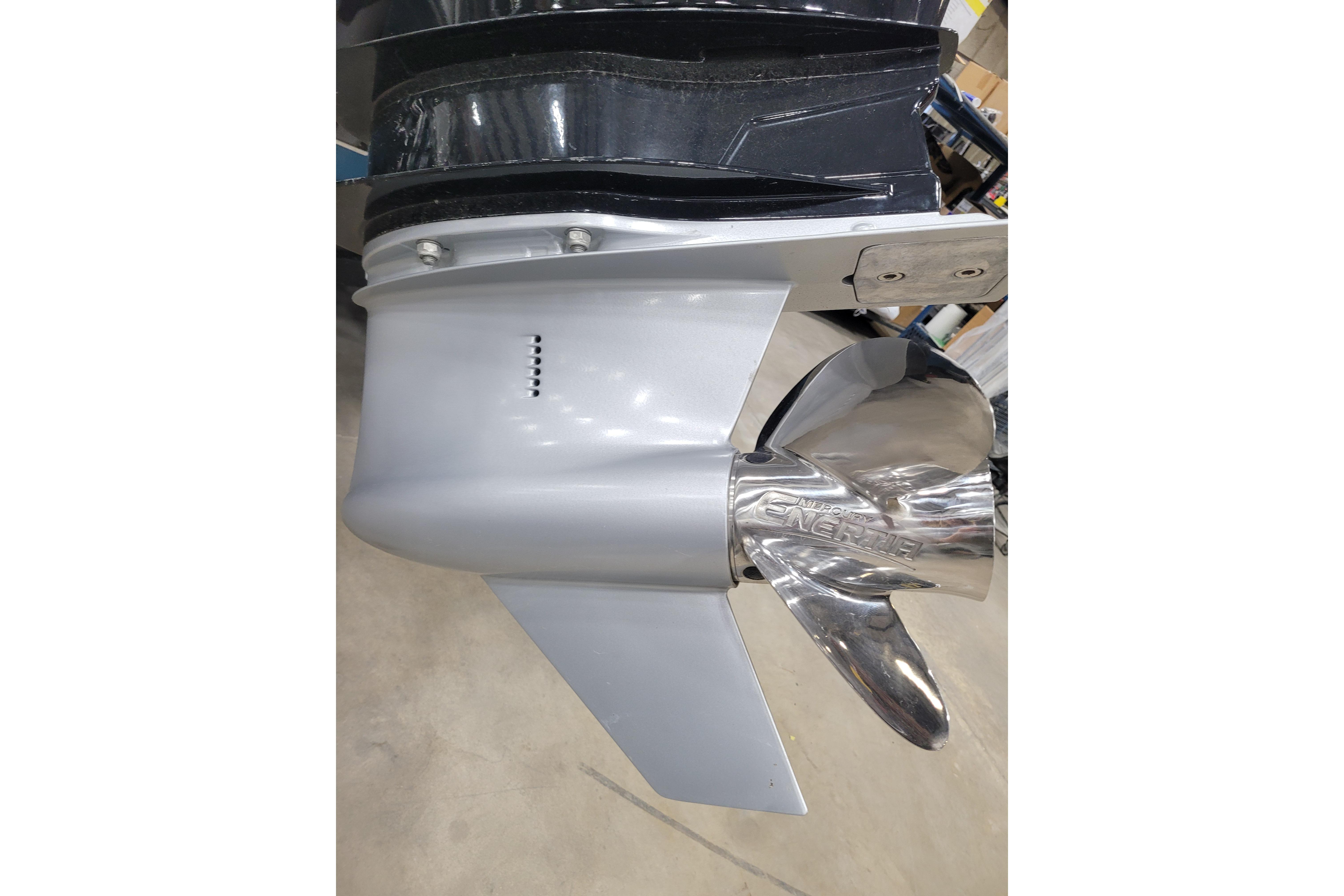 Close-up of a 2026 Tahoe 2150 boat propeller, showcasing sleek metallic design.