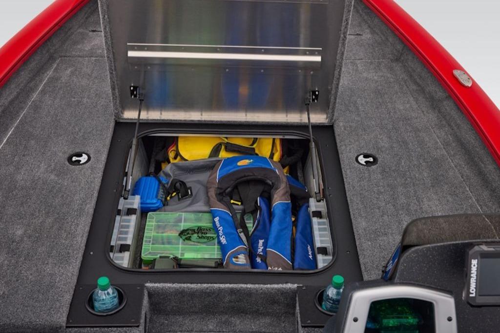 2026 Tracker Pro Team 190 boat storage compartment with fishing gear and life jackets.