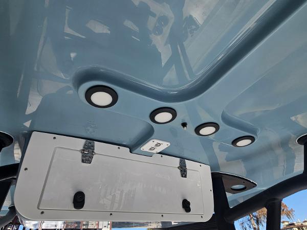 2026 Sea Hunt BX 22 BR boat underside with recessed lighting and storage compartment.