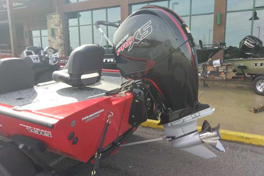 2026 Tracker Pro Team 195 boat with Mercury Pro XS outboard motor, displayed outdoors.