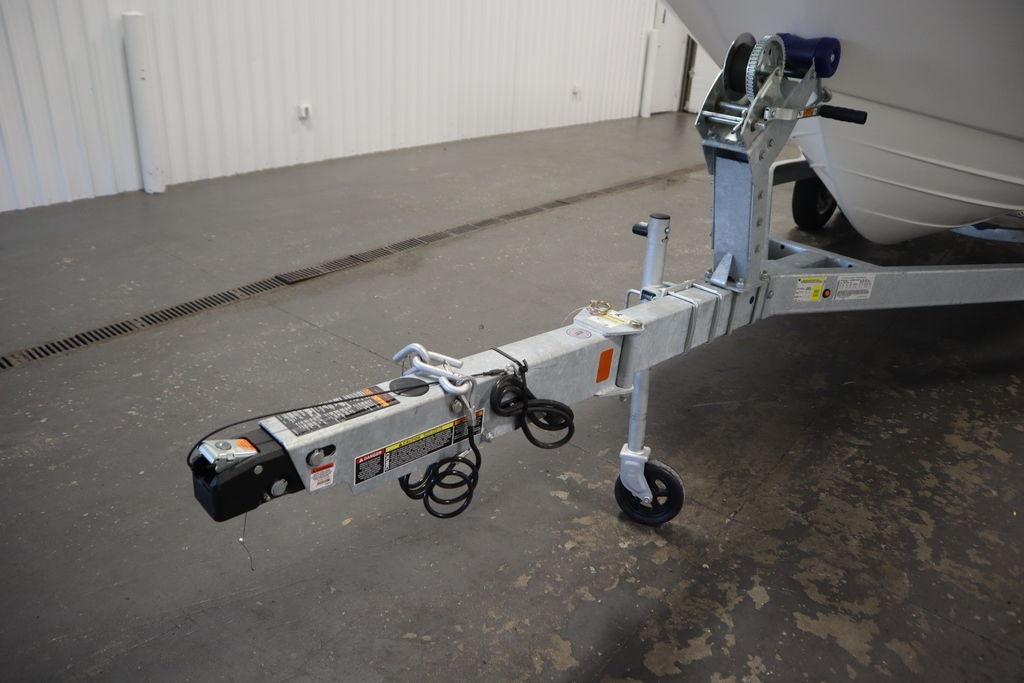 Trailer hitch of 2026 Bayliner Trophy T20CC boat in a garage setting.