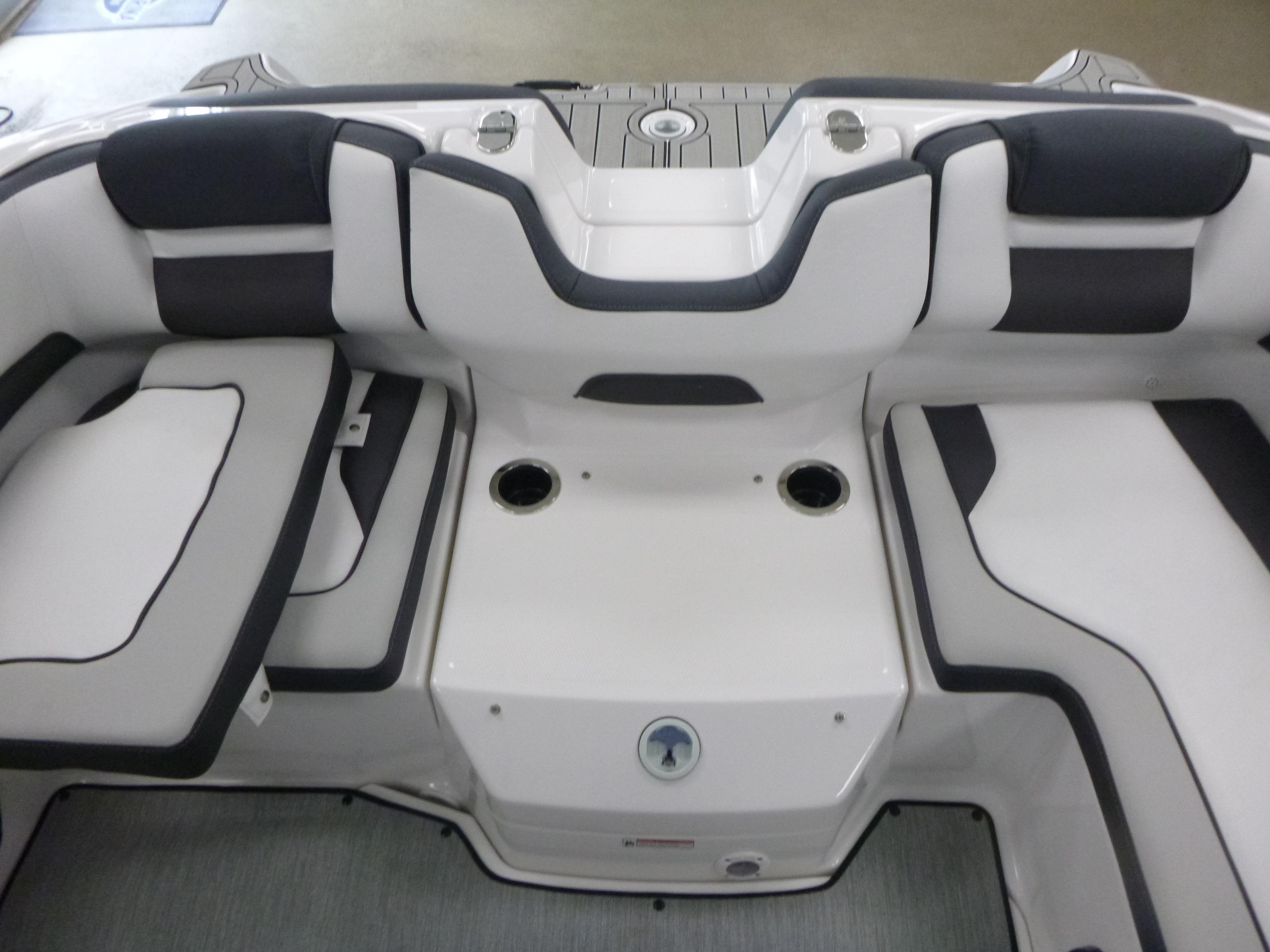 2025 Yamaha Boats AR195 interior seating with sleek design and cup holders.
