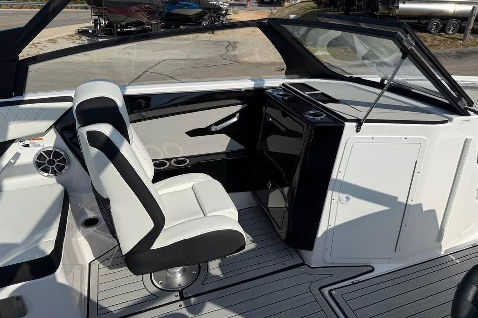 2026 Yamaha Boats 222S interior with sleek seating and modern dashboard design.