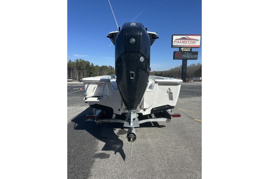 2026 Sportsman Masters 247 Bay Boat rear view with powerful outboard motor.