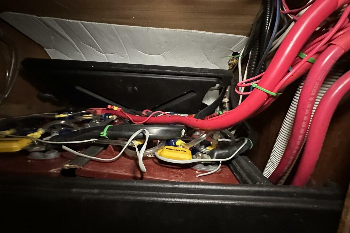Electrical wiring and components inside a 1979 Hughes 3910 model.