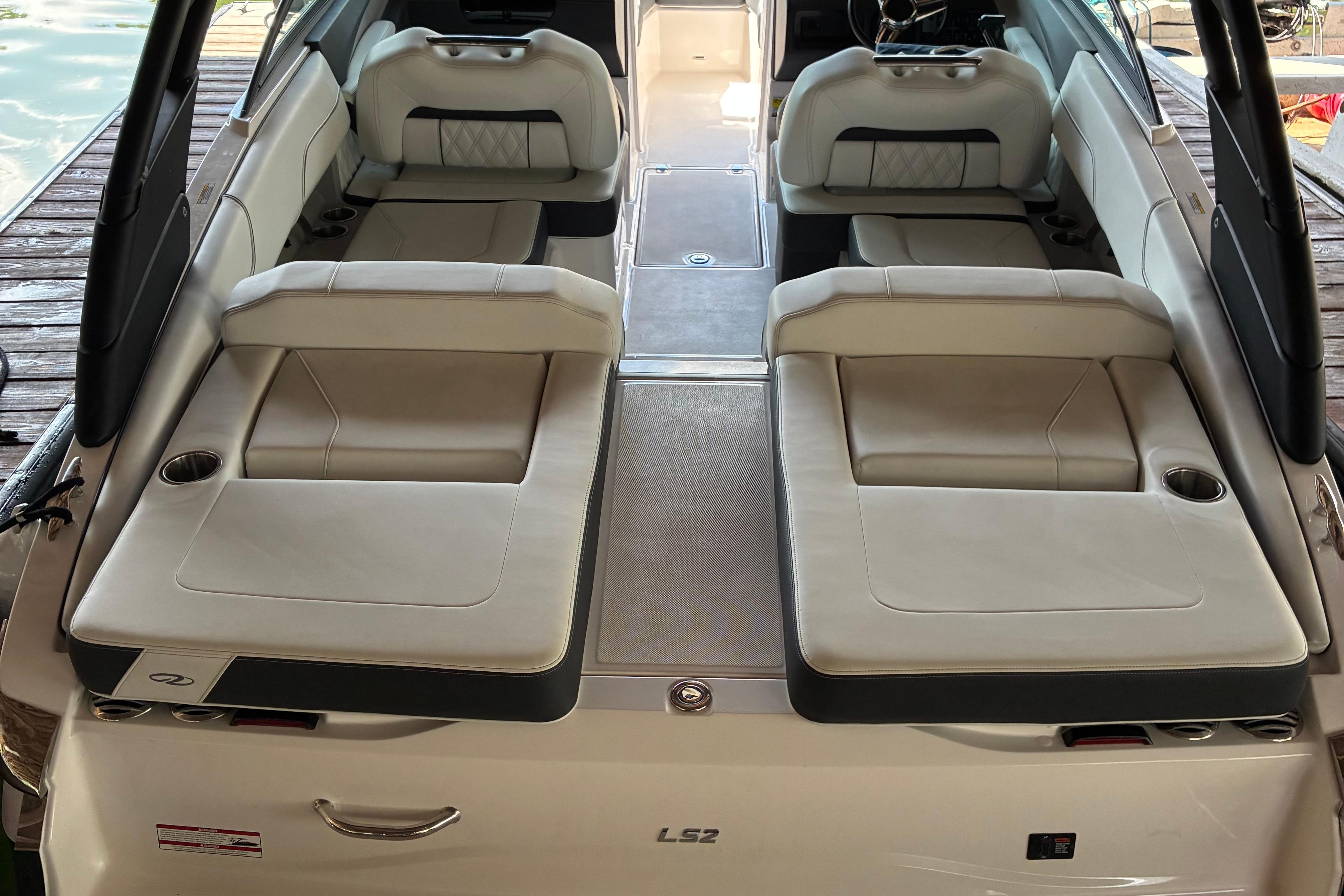 2025 Regal LS2 boat interior with luxurious seating and cup holders.