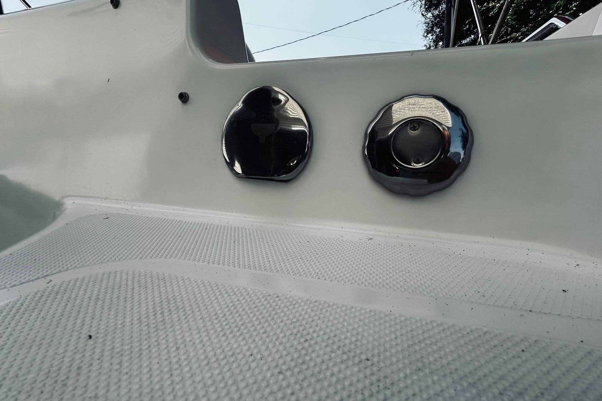 2013 Hurricane SunDeck Sport 201 OB boat deck with chrome fittings.