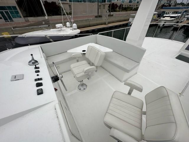 Modern Bracewell 41 yacht deck with seating, 2025 model, docked at marina.