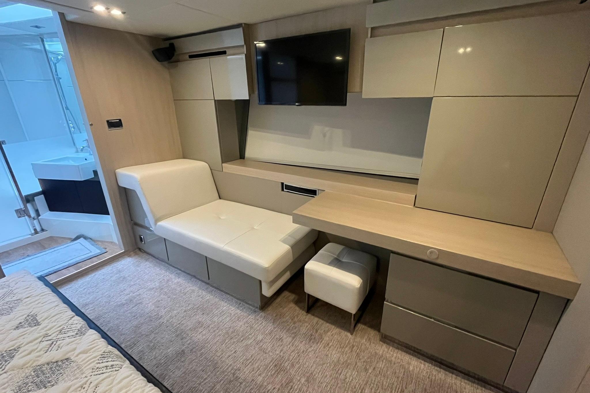 Luxurious interior of 2012 Fairline Targa 58 Gran Turismo yacht with modern furnishings.