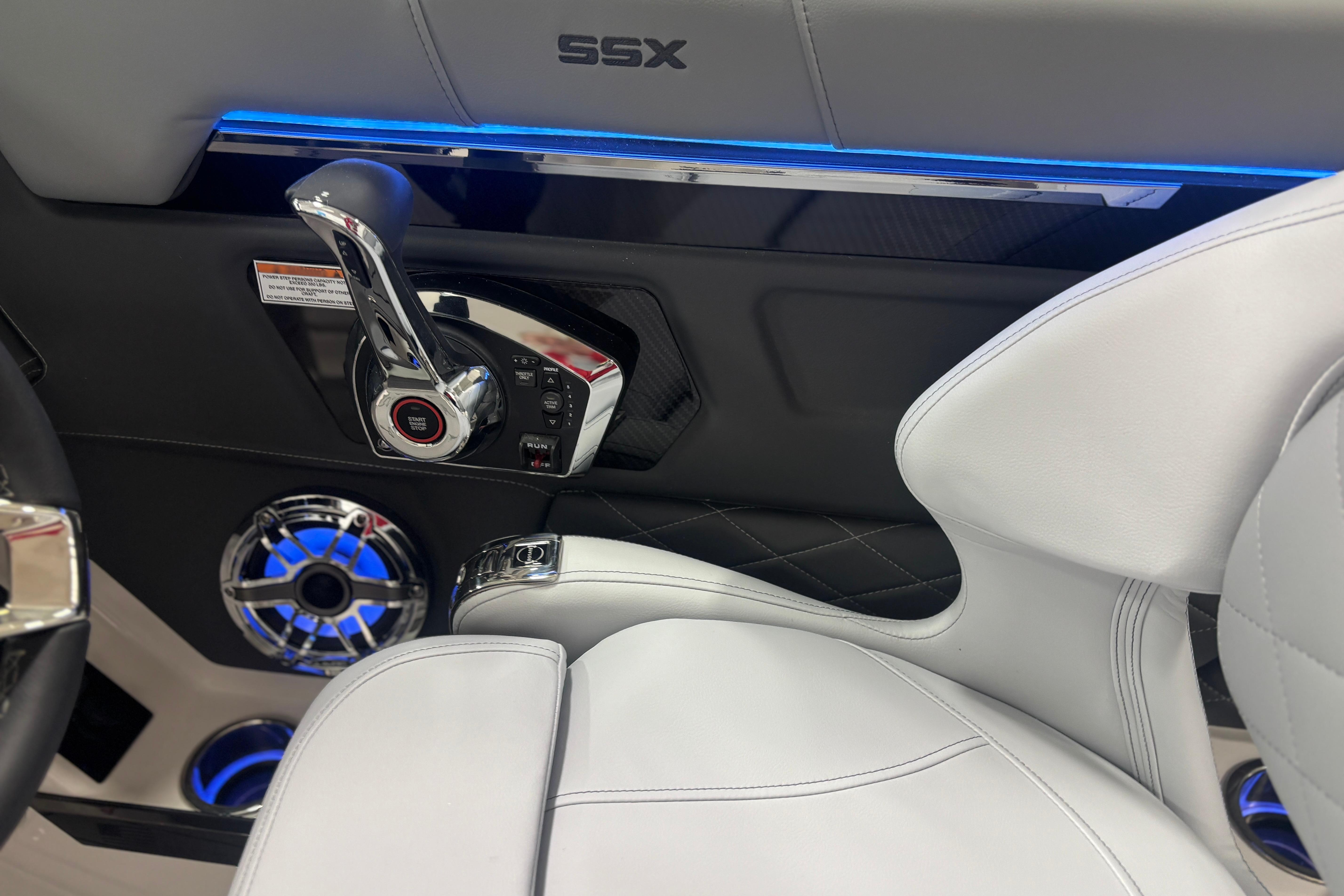 2026 Chaparral SSX 30 boat interior with sleek controls and illuminated speakers.