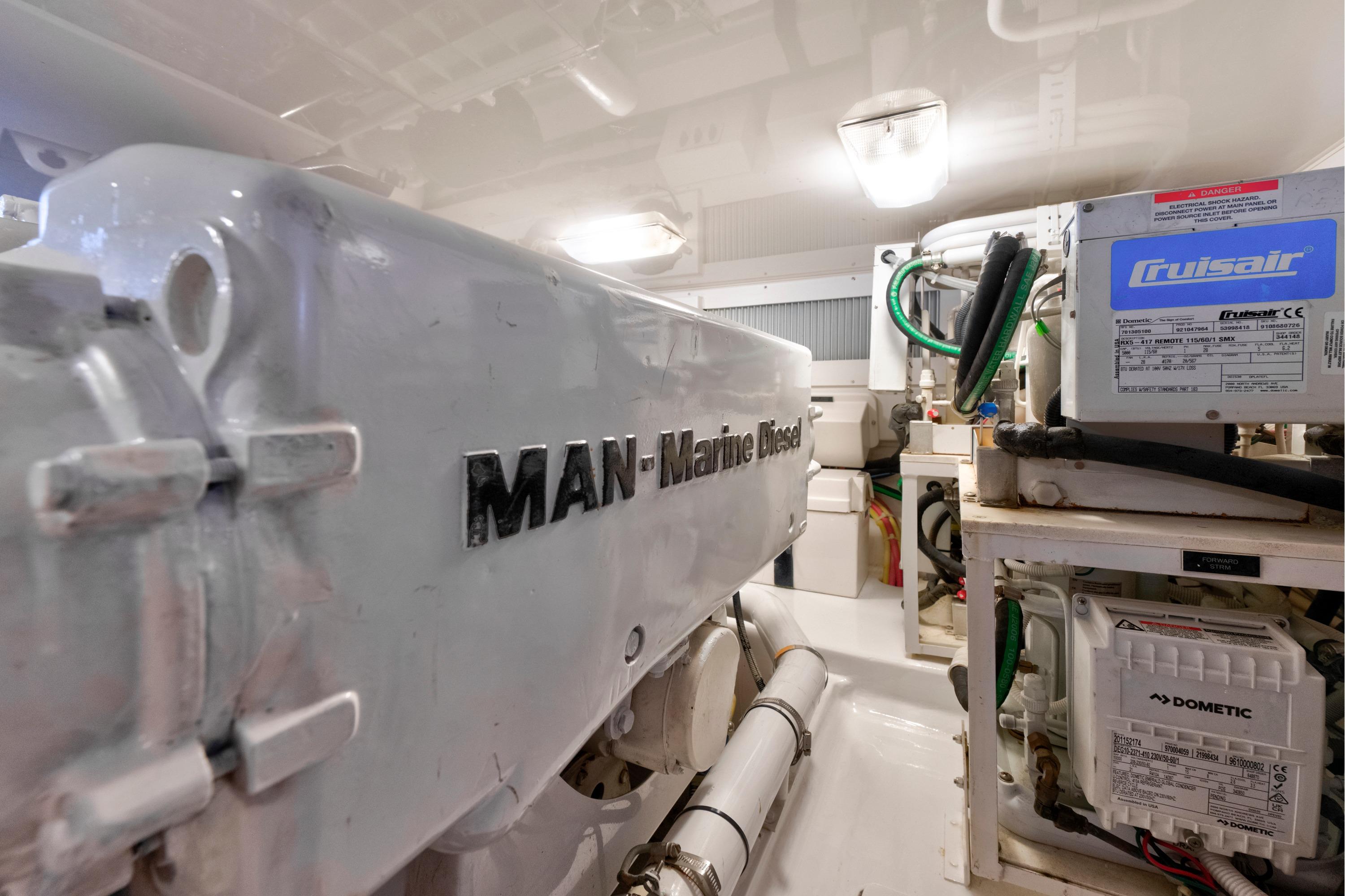 Engine room of 2009 Viking 50 Convertible with MAN Marine Diesel and Cruisair systems.