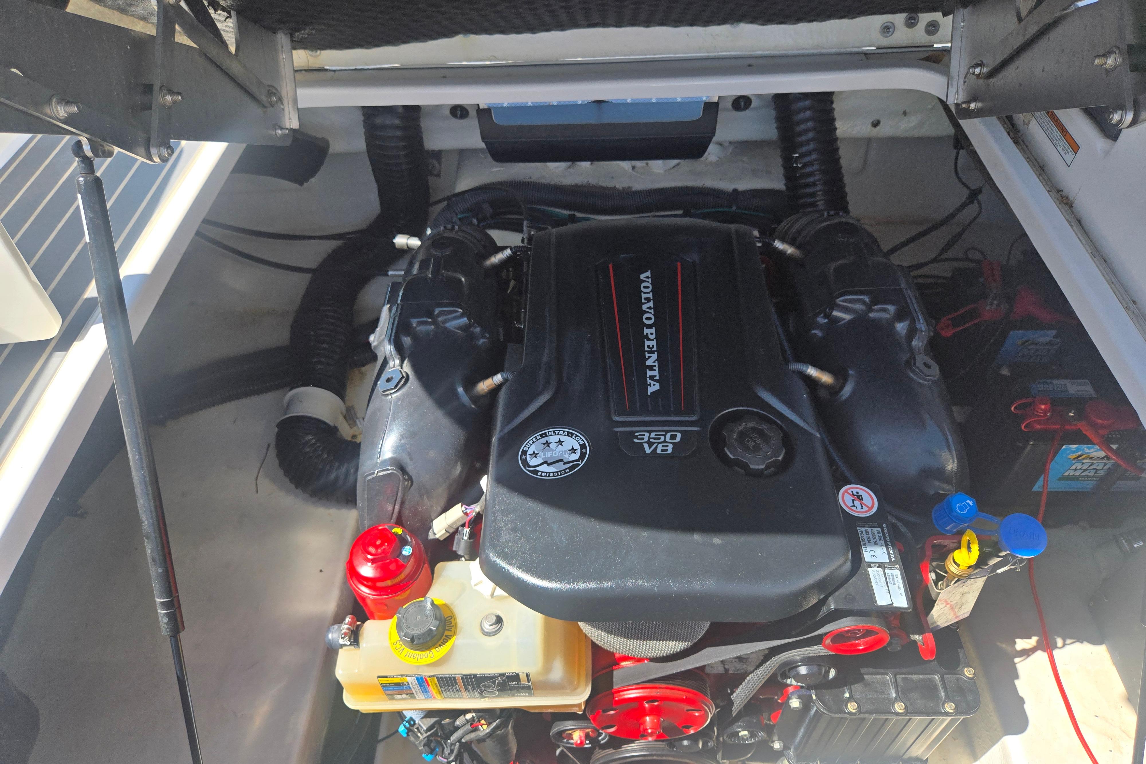 Engine compartment of 2018 Chaparral 267 SSX with Volvo Penta 350 V8 engine.