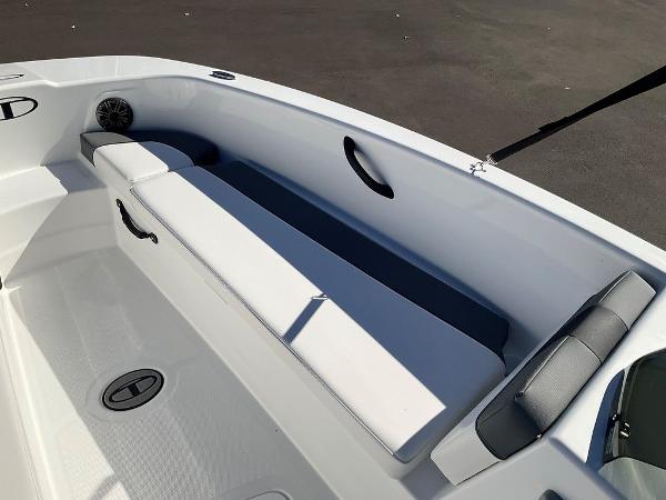 2025 Tahoe T18 boat interior with white seating and storage compartments.