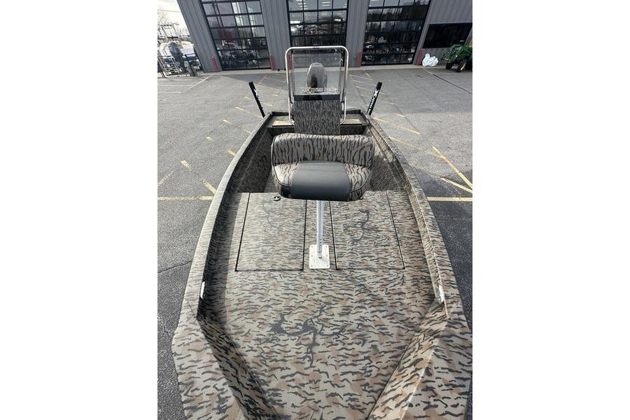 2026 Xpress H190B Bay boat with camouflage design, parked outdoors.