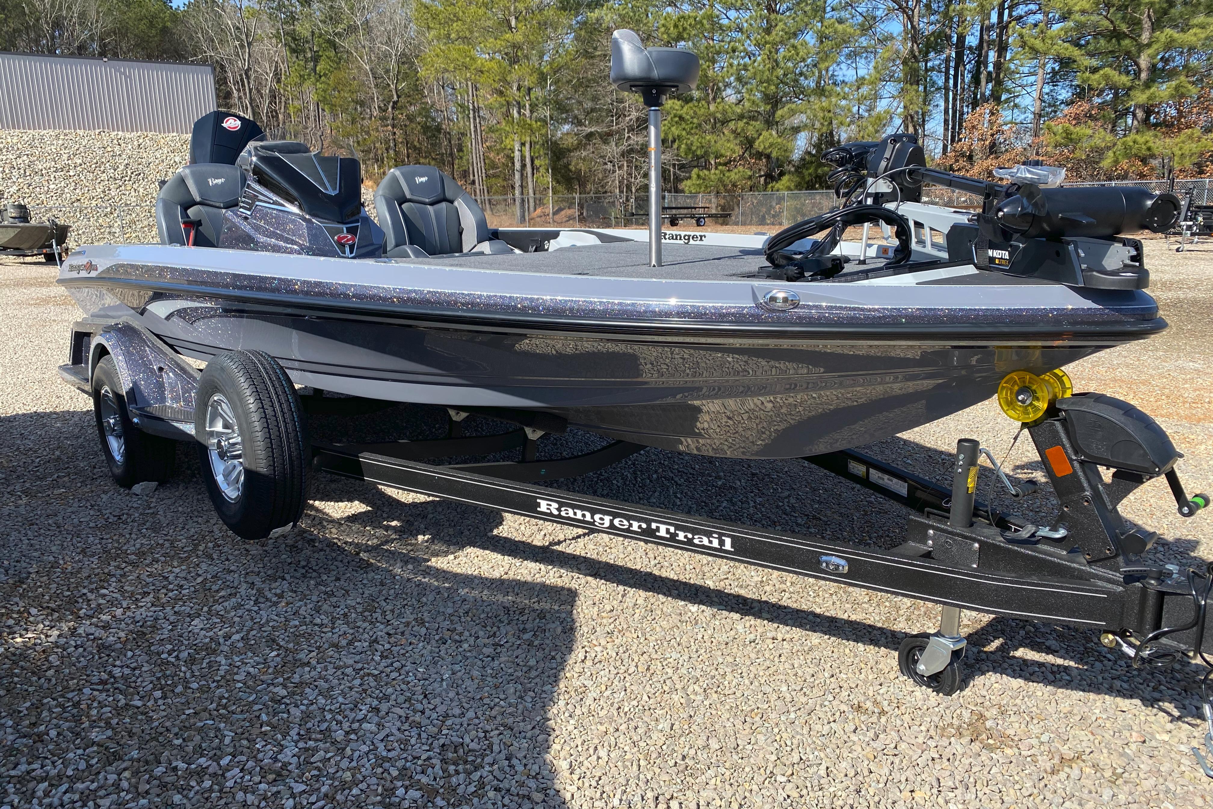 2026 Ranger Z519R boat on trailer, parked outdoors on gravel.