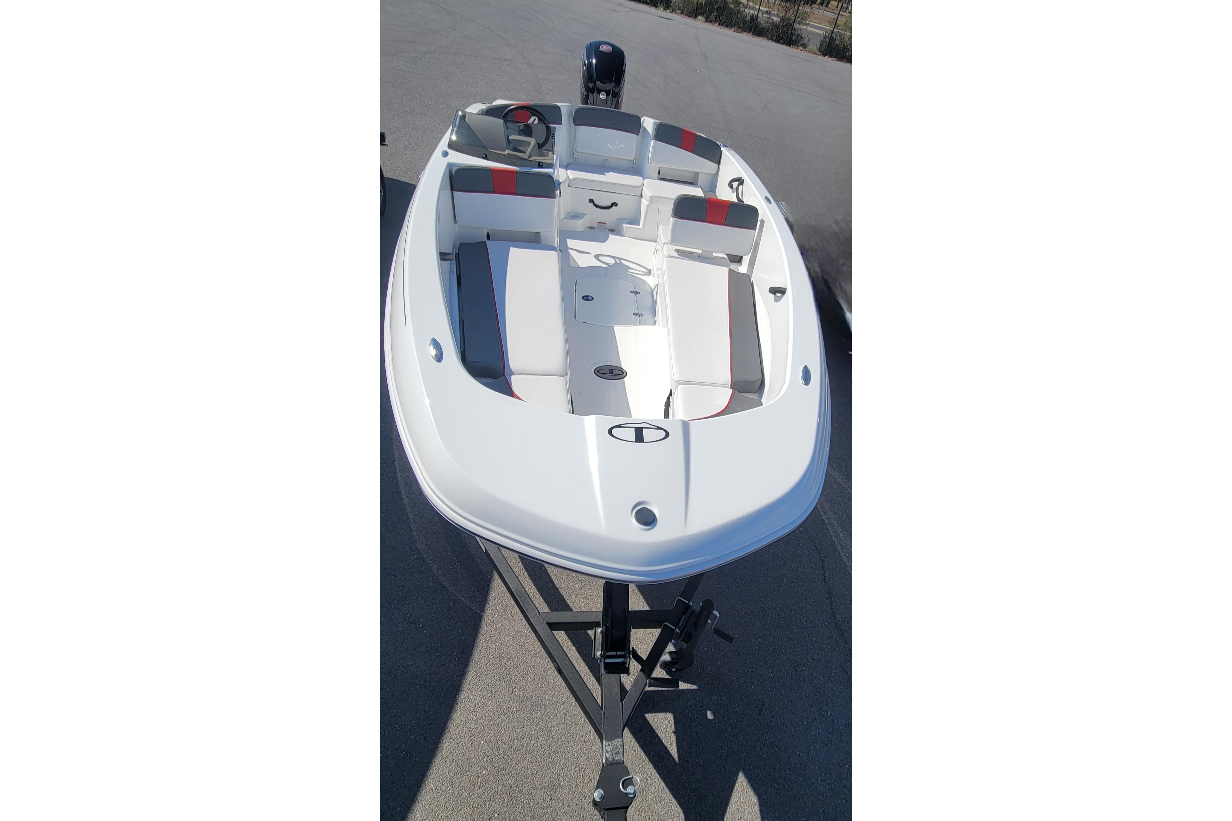 2025 Tahoe T18 boat on trailer, featuring sleek white design and spacious seating.