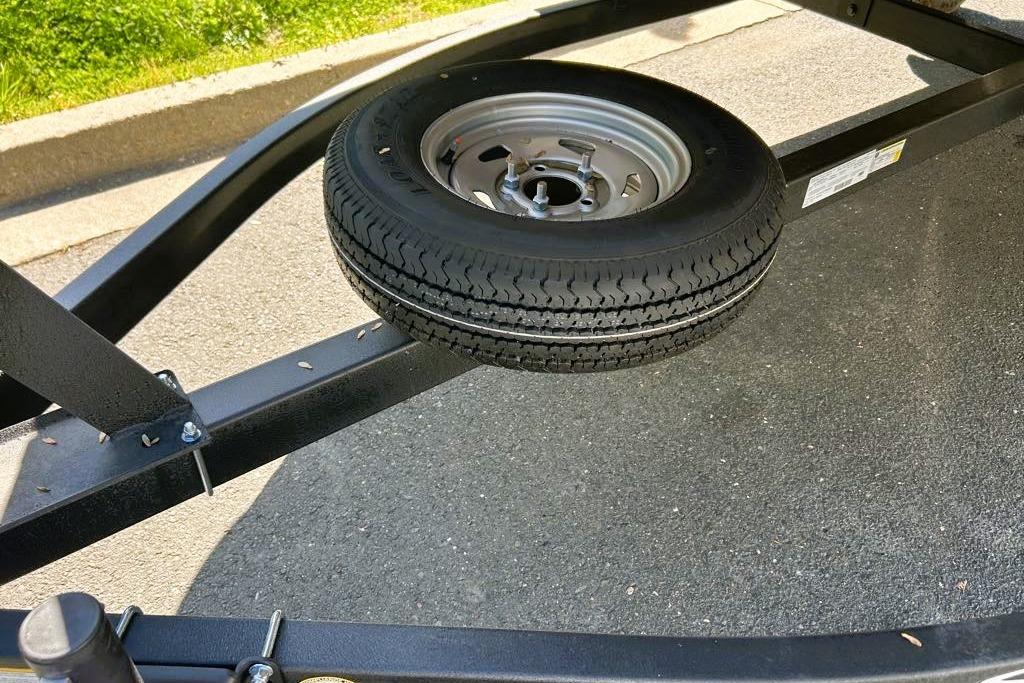 Trailer frame with spare tire for 2026 Sun Tracker Party Barge 16 DLX.