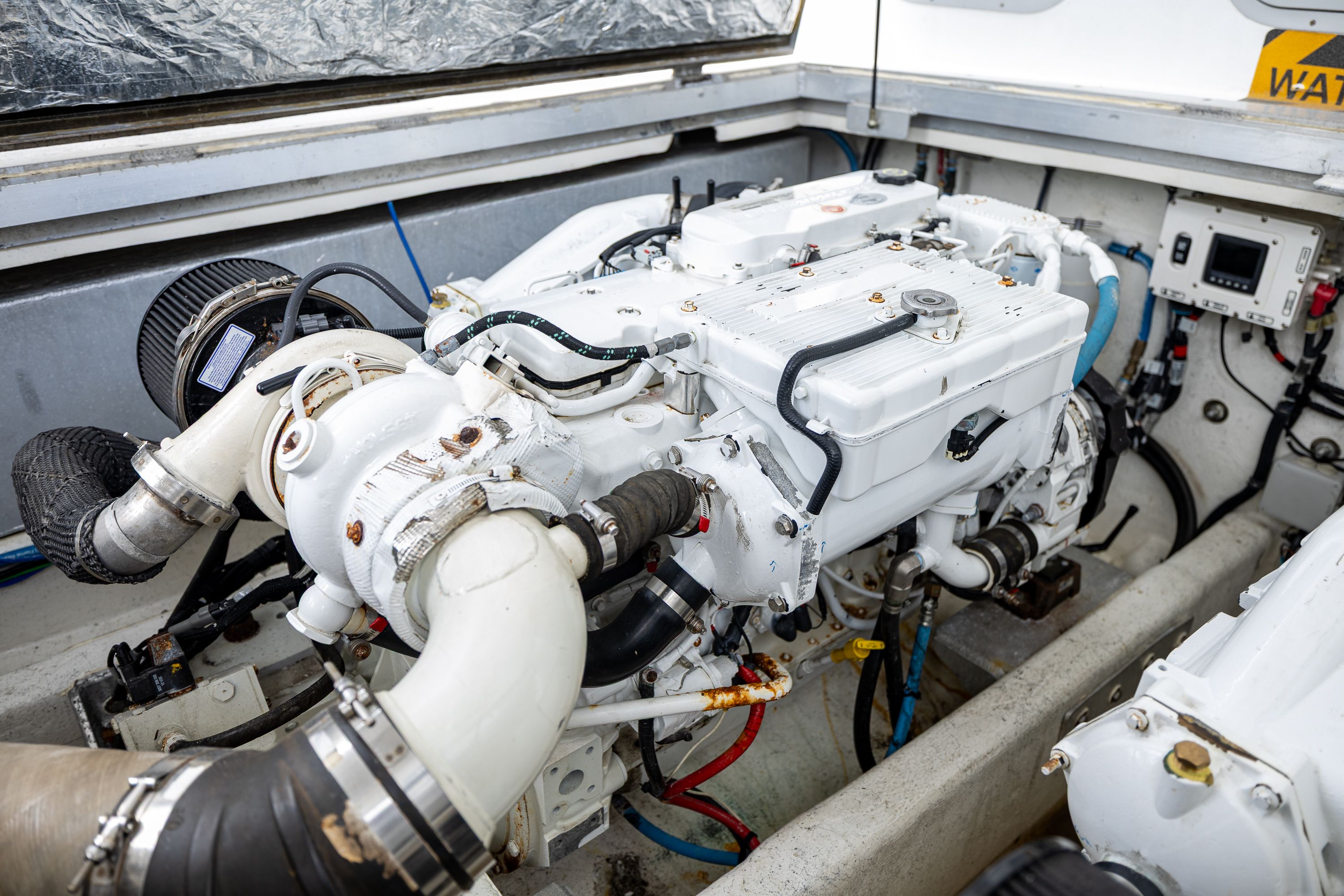 Engine compartment of a 2019 Newton 36' Dive Special boat.