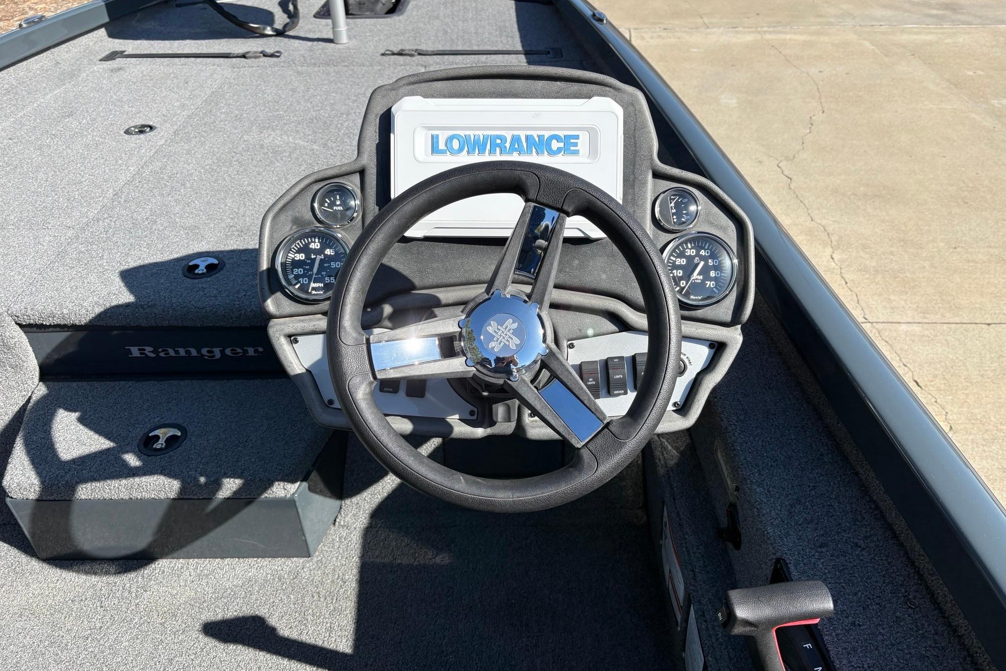 2024 Ranger RT198P boat dashboard with steering wheel and Lowrance display.