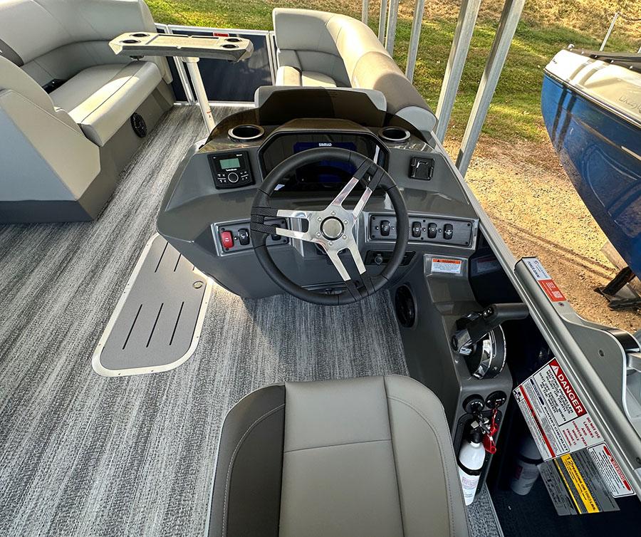 2025 Bennington 22 S Swingback boat interior with modern helm and seating.