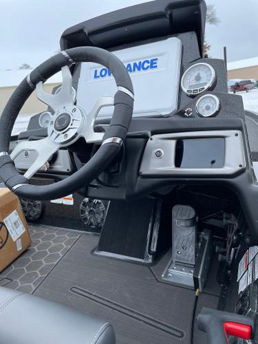 2023 Nitro Z20 boat dashboard with steering wheel and Lowrance electronics.