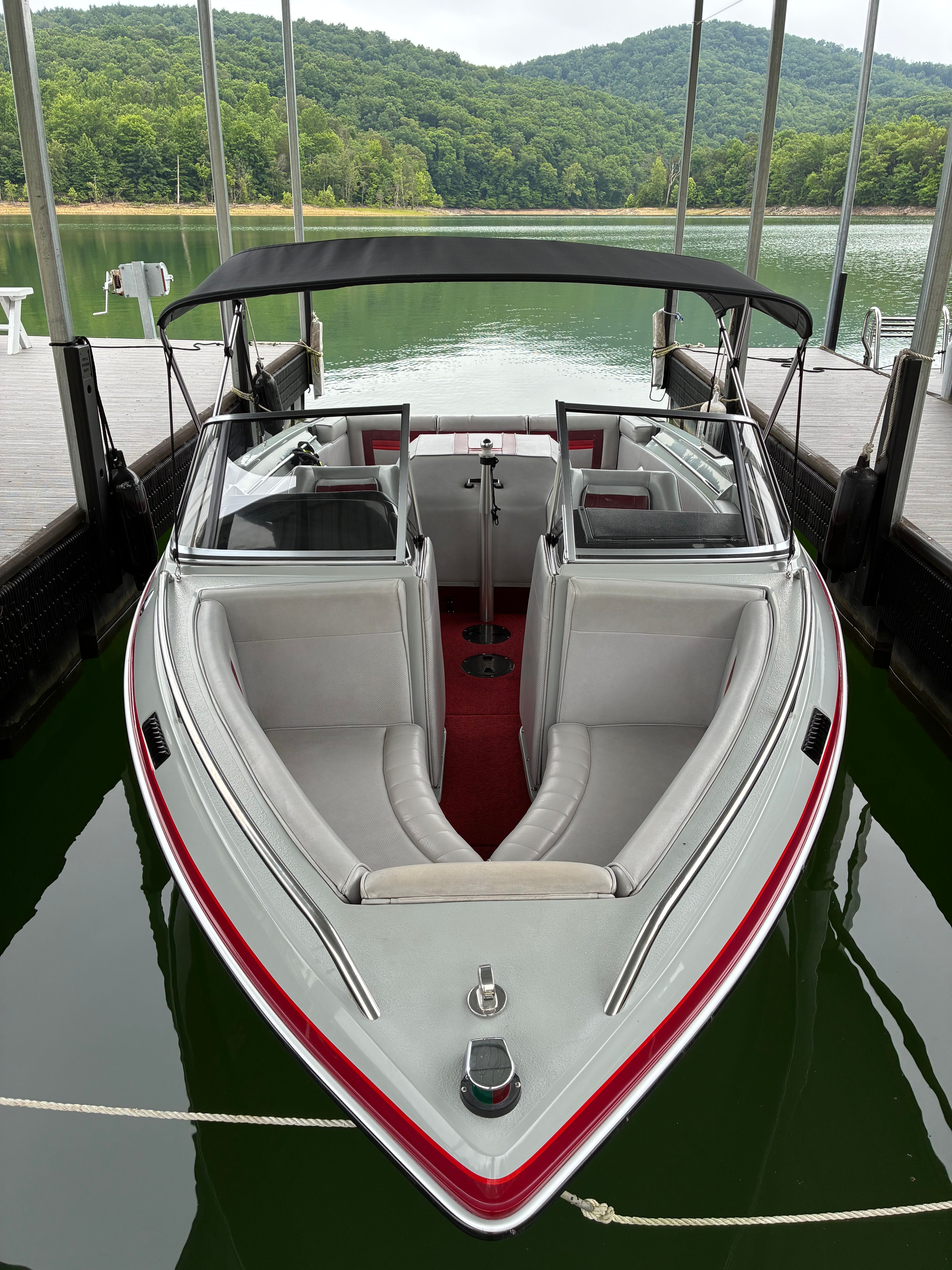 1989 MasterCraft TriStar 190 in a covered boathouse.