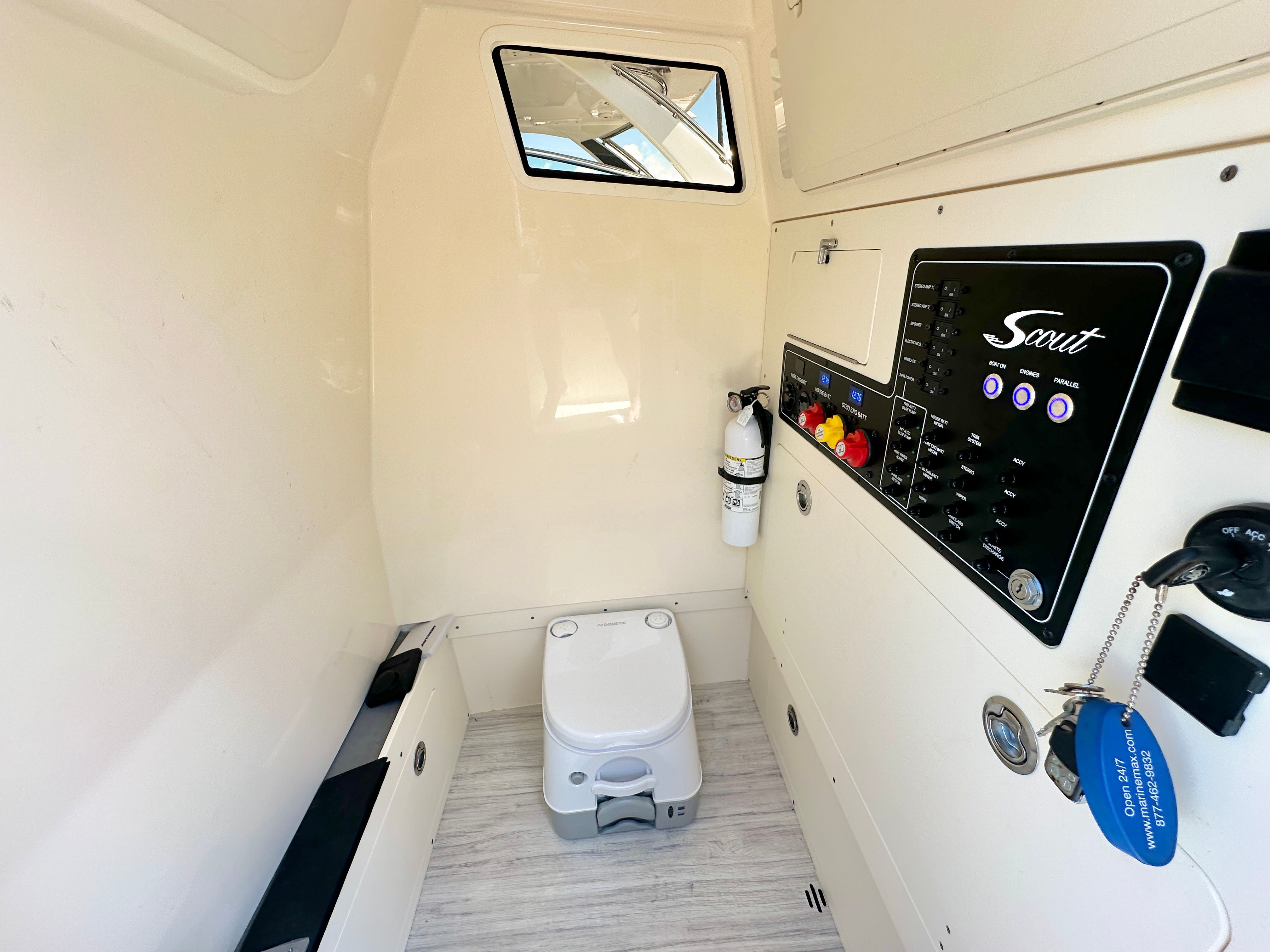 Interior of the Scout 281 XSS featuring a toilet and control panel.