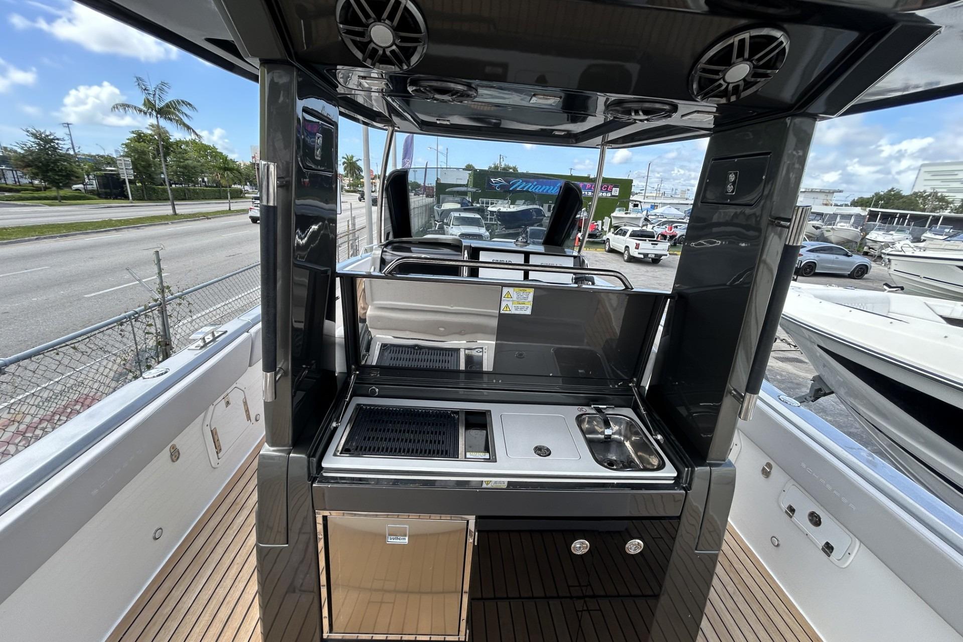 Outdoor kitchen on 2023 Schaefer V33 yacht with grill and sink.