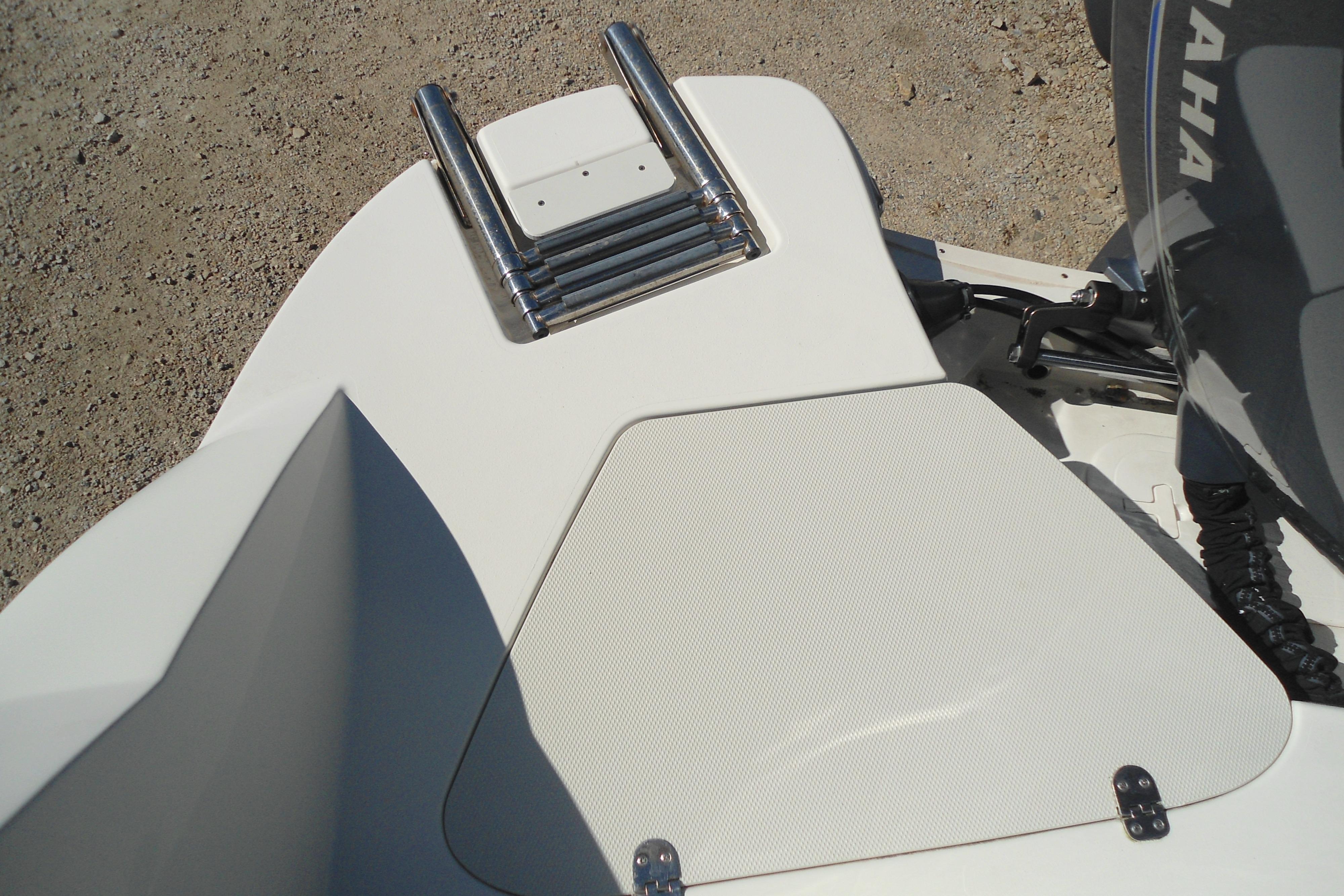 2019 Stingray 201 DC boat swim platform with ladder and Yamaha engine.