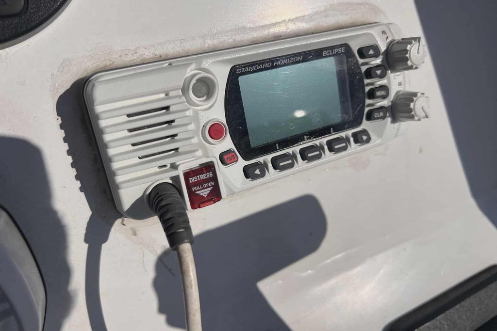 Standard Horizon Eclipse marine radio on a 1997 Gravois 20CC boat dashboard.