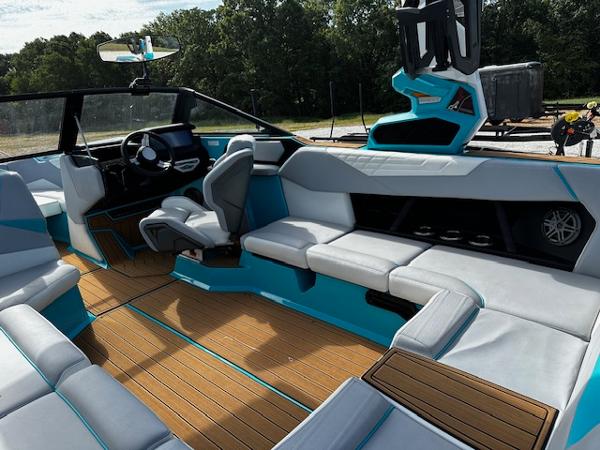 2022 Nautique S23 boat interior with modern seating and sleek design.