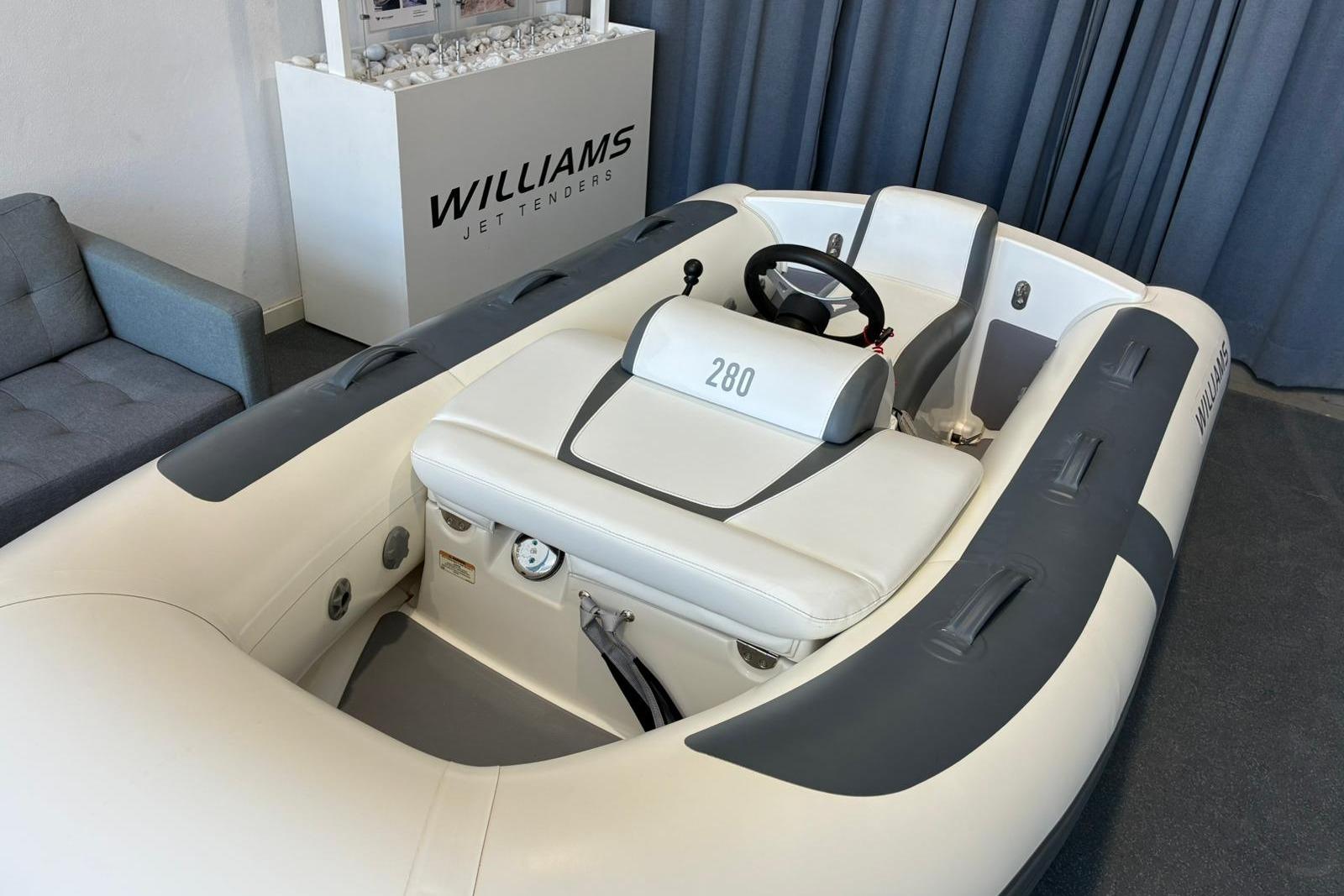 2024 Williams Jet Tenders Minijet 280, white and gray, displayed indoors.