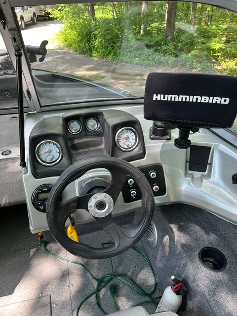 The image shows the cockpit of a 2016 Tracker Pro Guide V-175 Combo boat.
