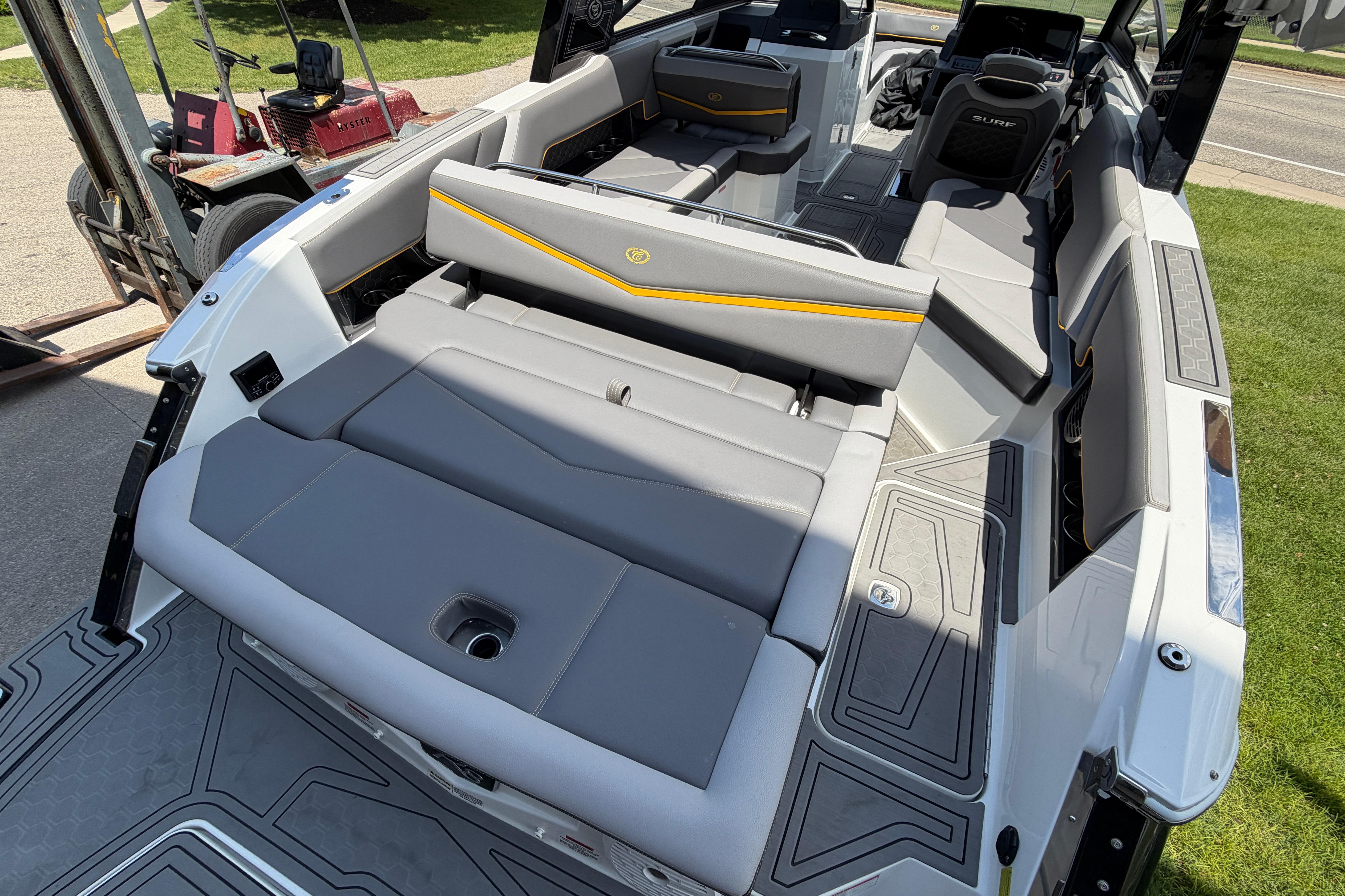 2021 Cobalt R8 Surf boat interior with gray seating and modern design.