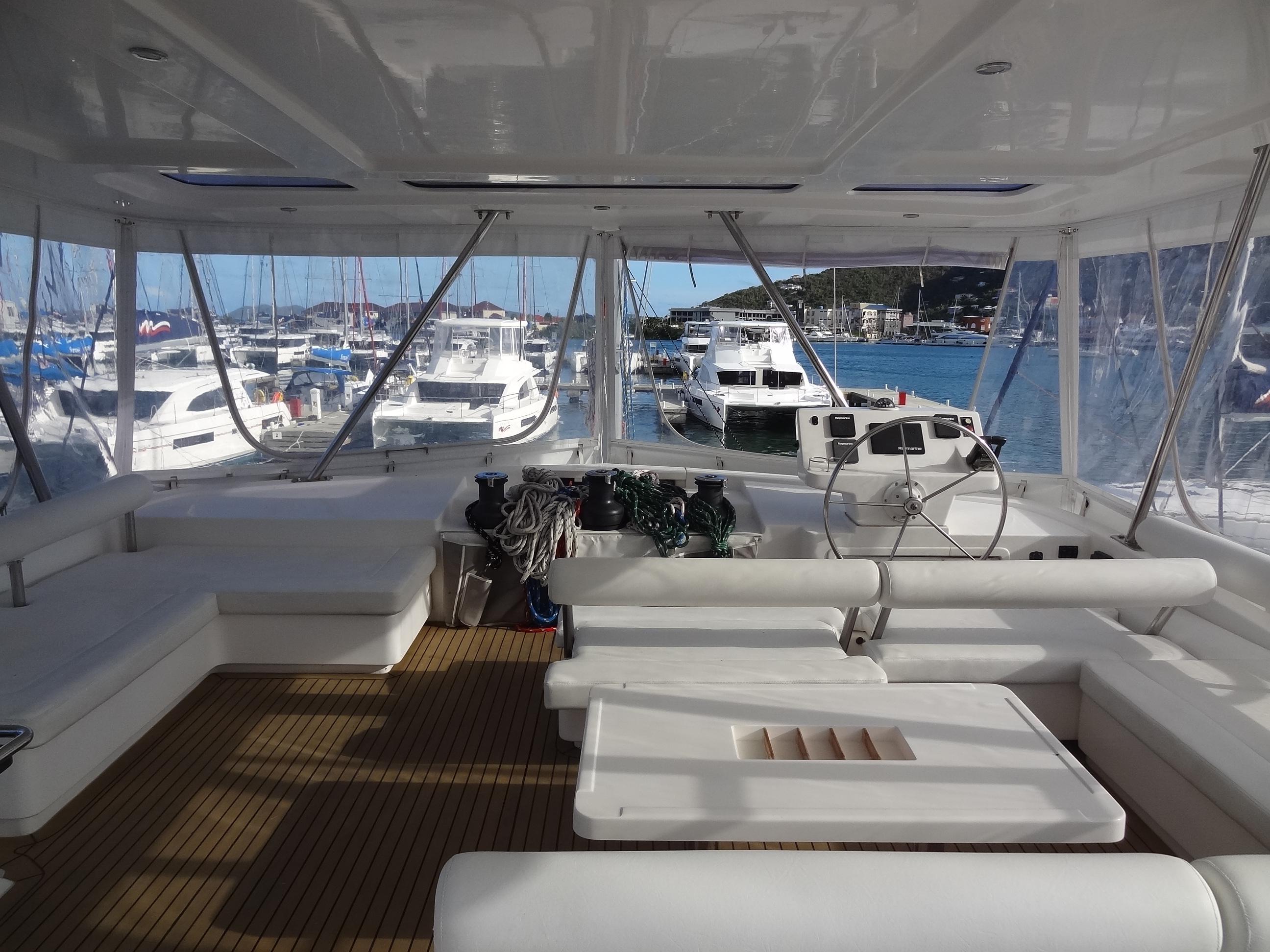 Interior of 2014 Leopard 58 yacht with marina view.