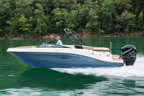 Manufacturer Provided Image: 2023 Sea Ray SPX 230 OB cruising on a lake with lush green forest background.