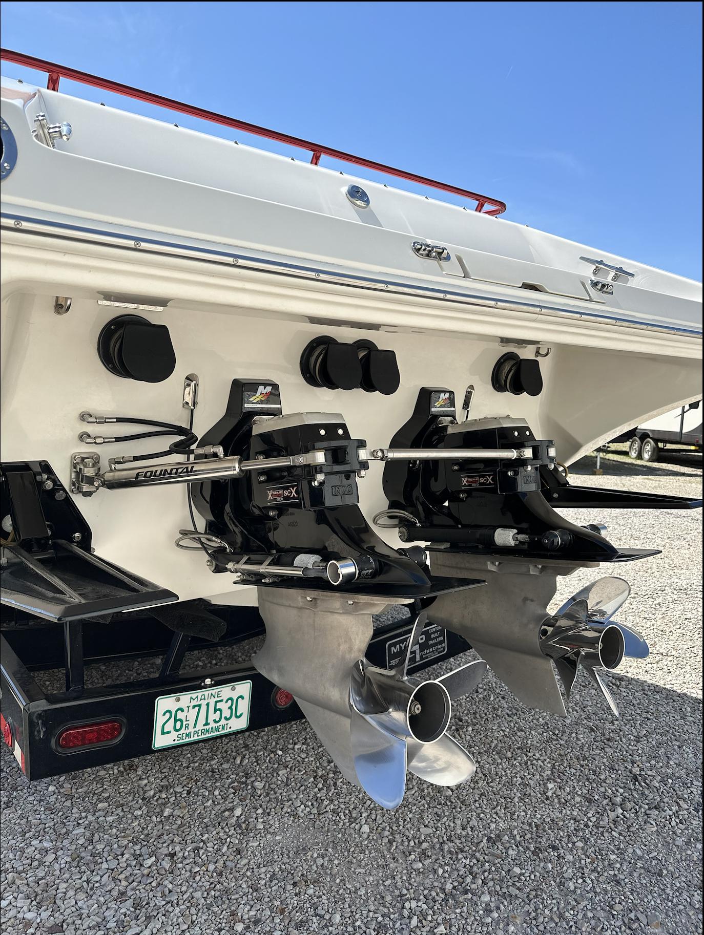 2003 Fountain 38 Lightning boat stern with dual propellers and Arizona license plate.